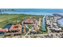 Stunning aerial view of waterfront community, lush mangroves, and intercoastal waterway at 4316 Sunray Ct # 34, Tampa, FL 33615