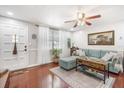 Inviting living room with hardwood floors, natural light, and modern furnishings at 5050 68Th N Way, St Petersburg, FL 33709