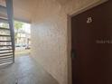 Close-up of the unit's entry, showing the unit number and a secure-locking mailbox at 7506 Presley Pl # 108, Tampa, FL 33617