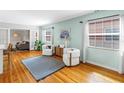 Bright living room featuring hardwood floors, modern furniture, and plenty of natural light at 138 17Th N Ave, St Petersburg, FL 33704