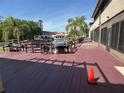 Waterfront condo community featuring private boat docks and grilling areas for outdoor enjoyment at 2571 Cyprus Dr # 1-102, Palm Harbor, FL 34684