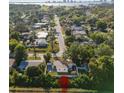Property aerial view shows proximity to lush landscapes and nearby cityscapes at 331 Barbara Cir, Belleair, FL 33756
