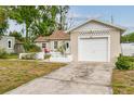Charming single-story home featuring a well-maintained lawn and a single-car garage at 3821 6Th N Ave, St Petersburg, FL 33713