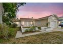 Charming single-story home featuring a well-maintained lawn and a single-car garage at 3821 6Th N Ave, St Petersburg, FL 33713