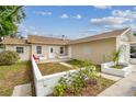Charming single-story home featuring a well-maintained lawn and a single-car garage at 3821 6Th N Ave, St Petersburg, FL 33713