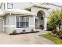 Charming home showcasing manicured landscaping and a welcoming entrance with beautiful decorations at 400 Westborough Ln, Safety Harbor, FL 34695
