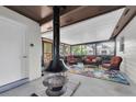 Cozy enclosed patio featuring comfortable seating and a unique overhead vent at 4812 Wynwood Dr, Tampa, FL 33615