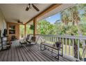 Relaxing covered patio with scenic views, perfect for outdoor seating and enjoying the natural surroundings at 8425 Jackson Springs Rd, Tampa, FL 33615