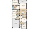 Detailed floorplan showcasing four bedrooms, a spacious living area, and a two-car garage at 1702 Trailhead Ln, Zephyrhills, FL 33541