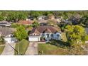 Aerial view of a well-maintained single-Gathering home in a lush, green neighborhood at 3208 Stevenson St, Plant City, FL 33566