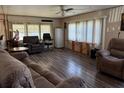 Comfortable living room with plush furniture and natural light at 4116 Cardoon Dr, New Port Richey, FL 34653