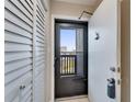 Hallway area with tiled flooring and a louvered door closet on the left at 803 Bahia Del Sol Dr # 66, Ruskin, FL 33570