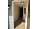 Inviting entryway featuring durable wood-look flooring and a view into the home at 1200 Abbey Crescent Ln, Clearwater, FL 33759