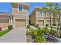 Inviting townhouse exterior with manicured landscaping and private entrances at 2138 Broadway View Ave, Brandon, FL 33510