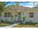 Attractive front entrance with a decorative door, potted plants, and a well-kept walkway leading to the entrance at 2708 5Th S St, St Petersburg, FL 33705