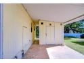 Practical carport with storage area, perfect for protecting vehicles and equipment from the elements at 34834 Carl Ave, Zephyrhills, FL 33541