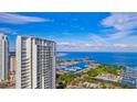 High-rise condo building overlooking a scenic harbor and city view at 175 1St S St # 3008, St Petersburg, FL 33701