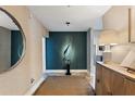Elegant hallway featuring modern decor, textured walls, and a stylish mirror at 175 1St S St # 3008, St Petersburg, FL 33701