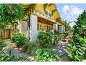 Charming home with well-manicured landscaping and a classic covered porch at 701 S Boulevard, Tampa, FL 33606