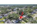 An elevated shot of a property nestled in a vibrant, tree-filled neighborhood at 7919 64Th N St, Pinellas Park, FL 33781