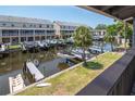 Scenic water view overlooking boat docks and canal-front residences at 200 Meres Blvd # 7, Tarpon Springs, FL 34689