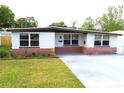 Charming single-story home featuring a well-maintained lawn and inviting curb appeal at 2936 39Th N Ave, St Petersburg, FL 33714