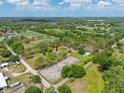 Expansive property featuring lush greenery, potential building sites, and mature trees ready for customization at 12511 Tyler Run Ave, Odessa, FL 33556