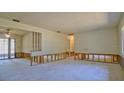 Spacious living room with sliding glass doors, ready to be remodeled at 39696 Meadowood Loop, Zephyrhills, FL 33542