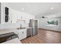 Modern kitchen featuring stainless steel appliances, sleek countertops, and ample cabinet space at 4701 14Th S Ave, St Petersburg, FL 33711