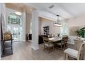 Inviting interior featuring an open floor plan, designer lighting, and ample natural light at 9980 Sago Point Dr, Seminole, FL 33777