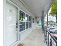 Exterior features of condo building include a walkway and parking at 4151 55Th N Way # 1056, Kenneth City, FL 33709