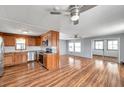 Open concept kitchen, with stainless appliances, flowing into the cozy living area at 4851 W Gandy Blvd # B3 L8, Tampa, FL 33611