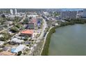 An aerial view of a beautiful condo complex near a picturesque river and adjacent to the city at 7037 Sunset S Dr # 205, South Pasadena, FL 33707