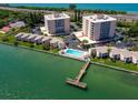 Condos with waterfront views, swimming pool, private dock, and nearby tennis court at 7430 Sunshine Skyway S Ln # 305, St Petersburg, FL 33711