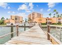 View of updated waterfront condos and amenities from a private pier with easy access to the ocean at 7430 Sunshine Skyway S Ln # 305, St Petersburg, FL 33711