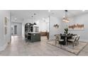 Spacious living area with a modern design, featuring an open floor plan and stylish decor at 806 W Adalee St, Tampa, FL 33603
