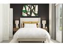 Serene bedroom features a plush bed, stylish nightstands, and sophisticated wall decor for a relaxing retreat at 17605 Happytrails St, Land O Lakes, FL 34638