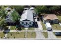 Charming single-story home with a well-maintained yard and driveway, offering comfortable living at 1515 E 31St Ave, Tampa, FL 33610