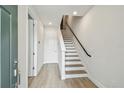 Bright entryway with modern stairs and durable floors provides a welcoming introduction at 3113 4Th N Ter, St Petersburg, FL 33713