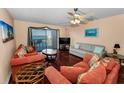 Spacious living room with water views, and lots of seating for friends and Gathering at 7700 Sun Island S Dr # 404, South Pasadena, FL 33707