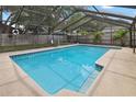 Relaxing screened-in pool area, perfect for entertaining or enjoying a private outdoor escape at 11467 93Rd St, Largo, FL 33773