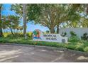 Entrance sign for the Tropical Shores community at 2310 Sunrise Se Dr, St Petersburg, FL 33705