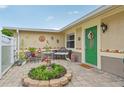 Inviting front entrance with decorative plants and decor providing curb appeal to the home at 6357 Spanish Main Dr, Apollo Beach, FL 33572