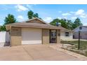 Attractive single-Gathering home with an attached garage, manicured lawn and neutral exterior at 6831 Greenwich Ave, New Port Richey, FL 34653