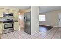 Kitchen featuring stainless steel appliances and granite countertops at 7338 Coventry Dr, Port Richey, FL 34668