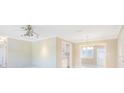 Bright, open living area with ceiling fan, crown molding, and access to kitchen at 8392 137Th Ln, Seminole, FL 33776