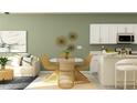 Open kitchen with white cabinets, a central island, and adjacent living area at 10842 Fowlers Bluff Ct, Tampa, FL 33647