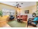 Bright living room featuring neutral walls, a ceiling fan, and comfortable seating at 201 11Th S Ave, Safety Harbor, FL 34695