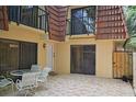 Private patio with tile flooring, perfect for outdoor dining and relaxation at 2725 14Th Ct, Palm Harbor, FL 34684