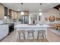 Bright kitchen features stainless steel appliances, stone countertops and counter seating at 400 38Th Ne Ave, St Petersburg, FL 33703